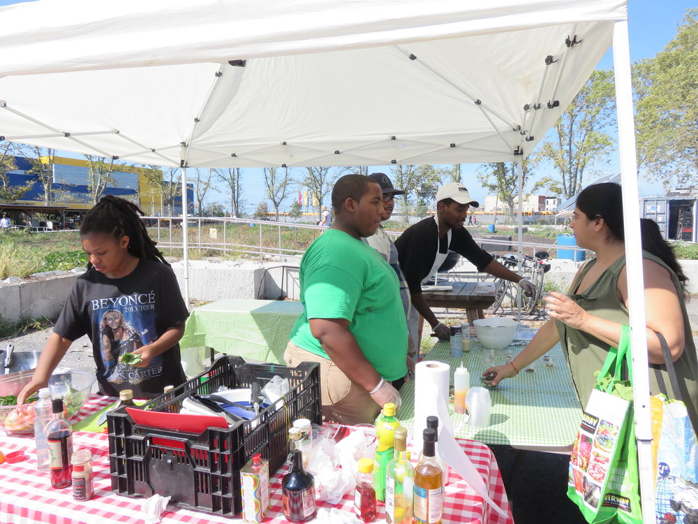  A cooking demonstration at our Saturday Farmers' Market led by Chef Jay, Otis, Cha-Cha, and Thomas. 